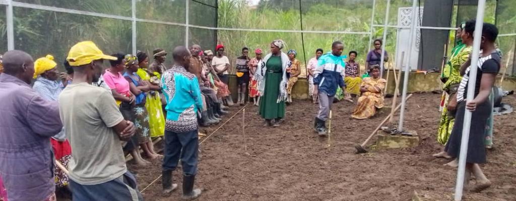 Beneficiaries of Kyerenga community tree nursery bed being trained on nursery bed management practices